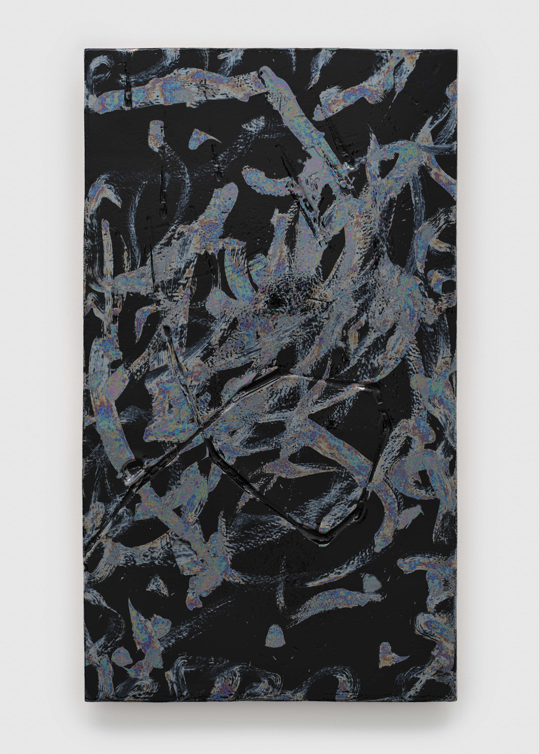 A black narrow rectangle in a portrait orientation features light grey streaks