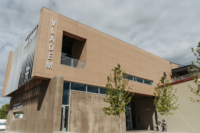 Entrance to the Vladem Contemporary museum, a two story concrete and beige building