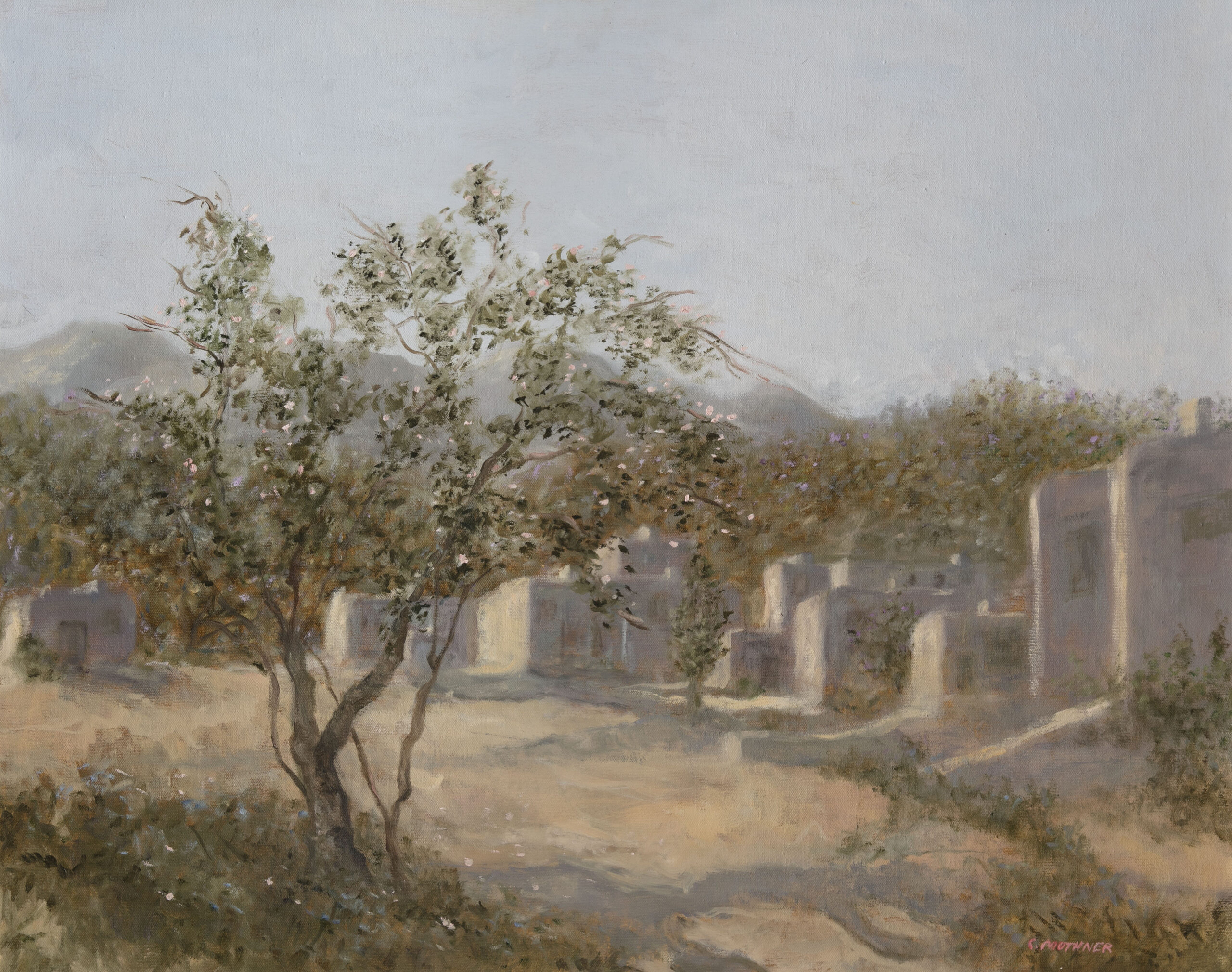 A color painting depicting a hazy, soft light falling on a row of adobe homes. In the foreground, a tree shows off a laden bounty of orange stone fruits.